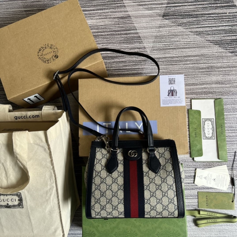 G*u*i top handle bags